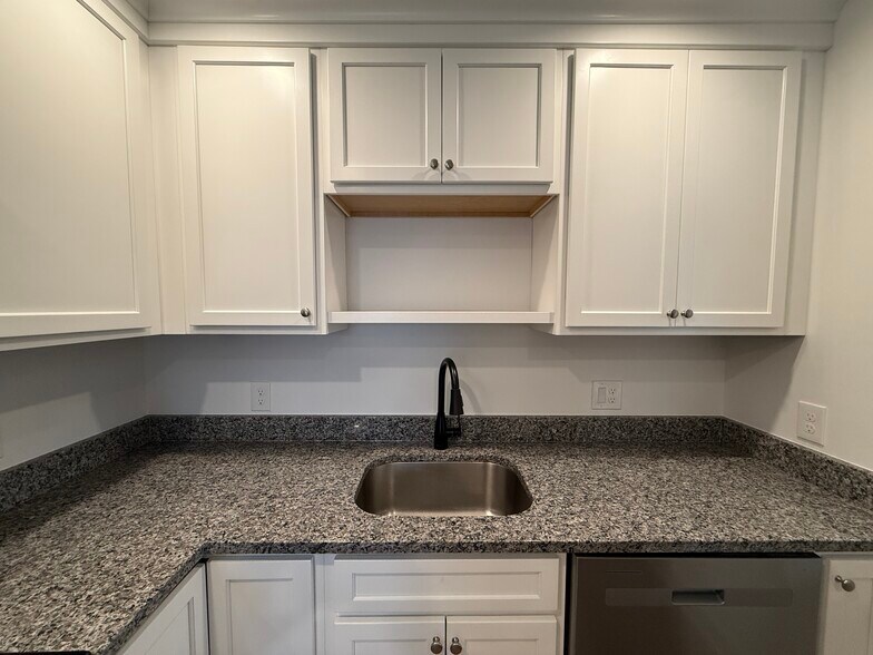 Granite countertops - 303 Wollerton St