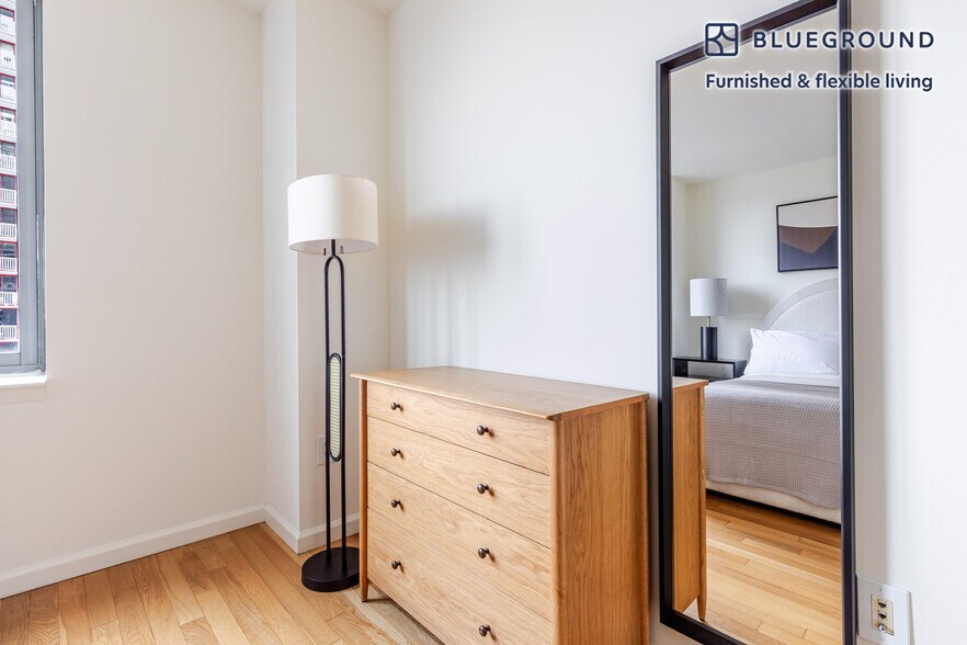 Building Photo - 4-75-75 48th Ave