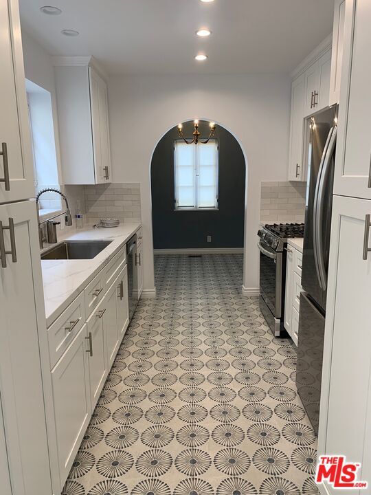 Building Photo - 8673 W Olympic Blvd