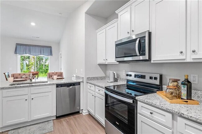 Building Photo - Earn Wealth While Leasing - Like a Homeown...
