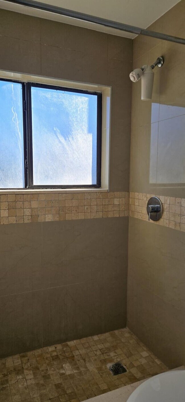 Building Photo - 10930 Royal Palm Blvd