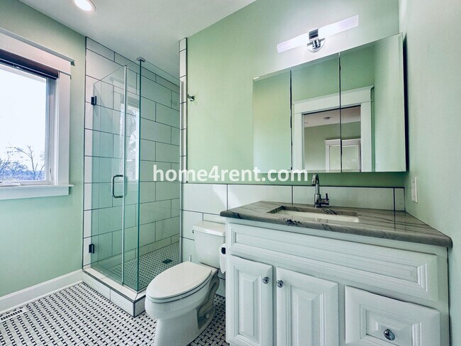 Building Photo - Charming Home Near Country Club Plaza w/ Gorgeous Updates, Wood Floors and a Two Car Garage!