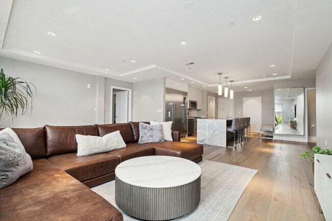 Building Photo - Elegant 2BR at The Adora | 1,500+ SF, Chef’s Kitchen & Garage Parking!