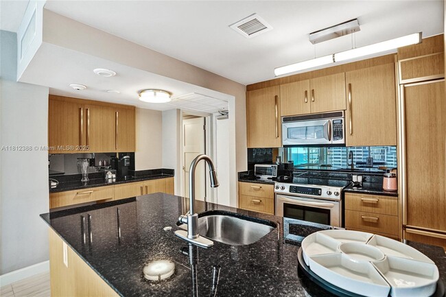 Building Photo - 10275 Collins Ave