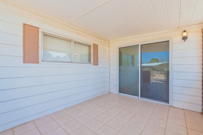 Building Photo - 10675 N Kilimanjaro Ave