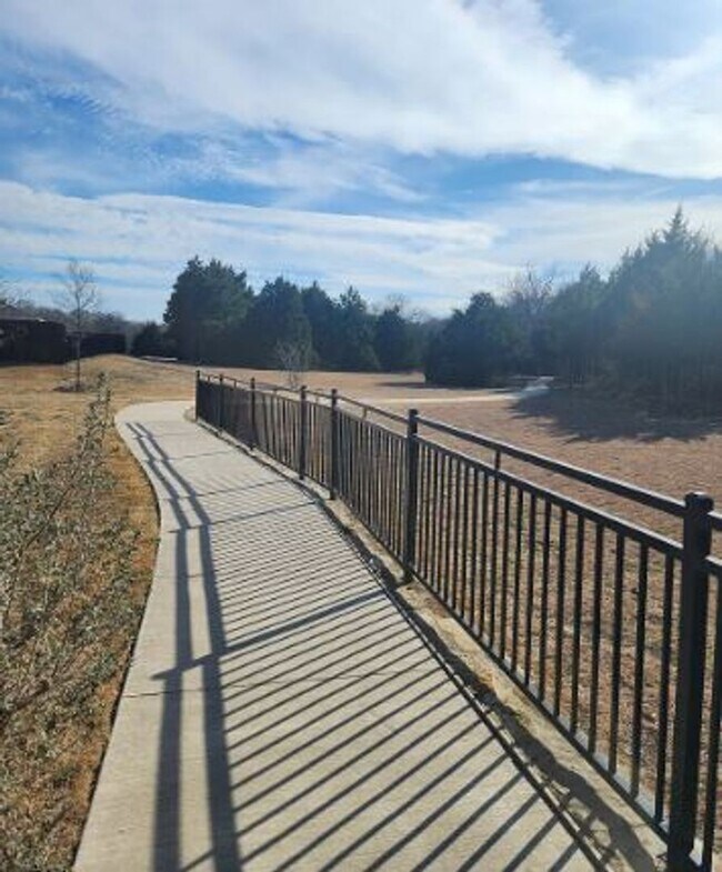 Building Photo - Backs to Wooded Area • Split Bedrooms • Modern & All-Electric