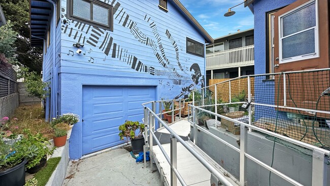 Building Photo - Cozy Studio with Fantastic Landscaping in ...