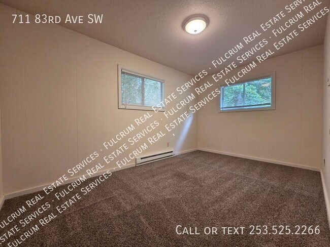 Building Photo - 711 83rd Ave SW