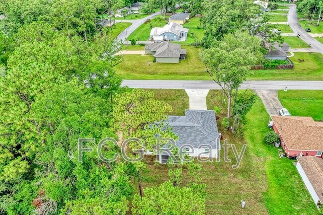 Building Photo - 6551 Hemlock Rd