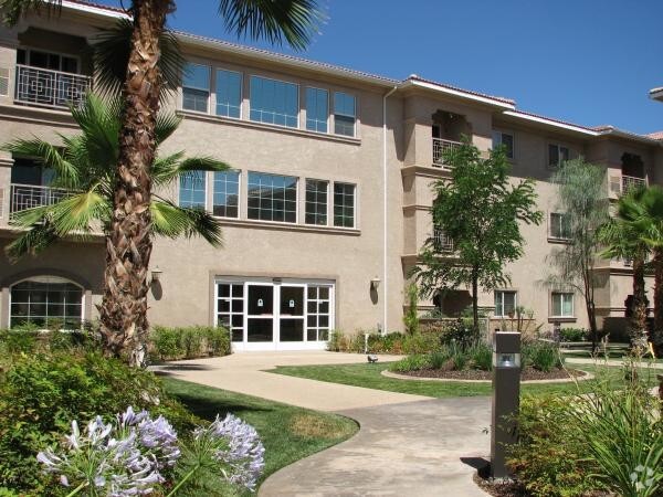 Walkway to building - Aurora Village II Senior Living 55+