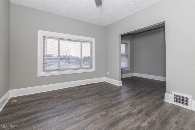 Building Photo - 1387 W 69th St