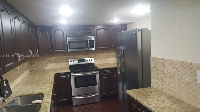 Building Photo - 3860 NE 170th St