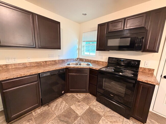 Building Photo - Available Now – Spacious 4BR Home on 1.5 Acres in Rural Hall!
