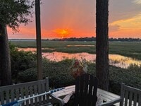 Building Photo - Beautiful Furnished Marsh Front Home - 6 mo Lease Term