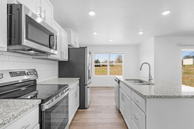 Building Photo - Nearly NEW home in Willard!