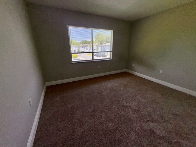 Building Photo - Spacious 3 Bed / 2 Bath Condo in Millennium Palms – Gated Community with Great Amenities!