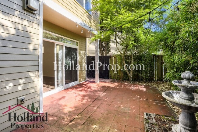 Building Photo - Charming 3-Bedroom Home with Wood Floors, Gas Fireplace & Private Patio