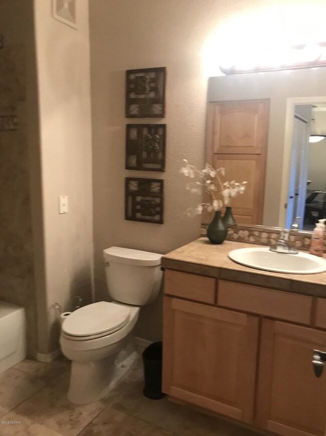 Building Photo - 7050 E Sunrise Dr