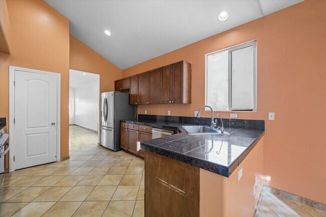 Building Photo - Welcome Home to this awesome 4 Bedroom Home