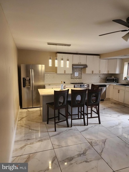 Building Photo - 8030-8000 Ditman St