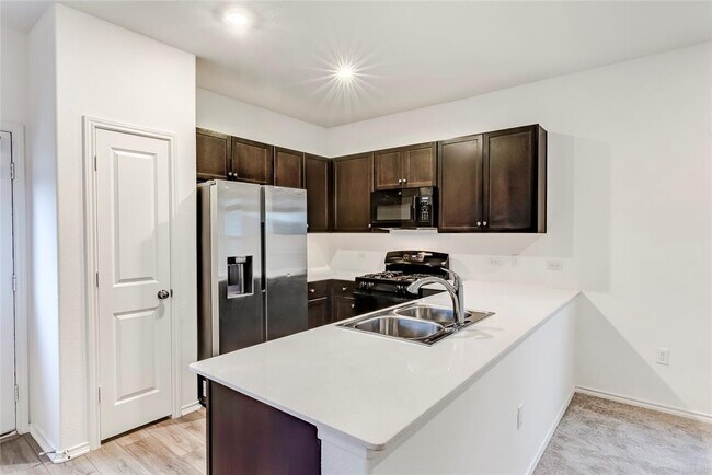 Building Photo - 7706 Poppy Petal Dr