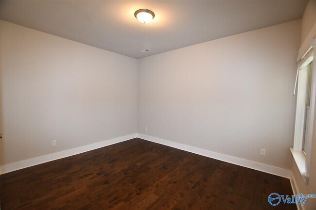 Building Photo - 702 Sluice Dr SW