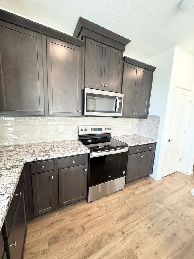 Building Photo - BRAND NEW 5 Bedrooms 3 Full Baths Solar Included Blossom Plan at Lilly Community SEE VIDEO