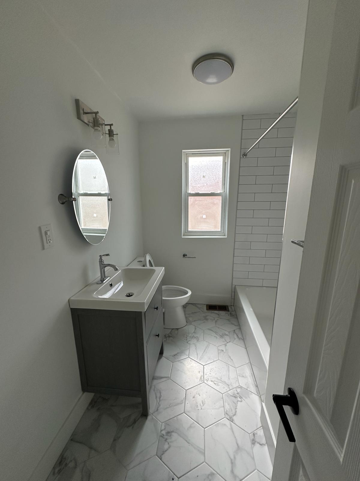 Beautifully renovated bathroom - 1247 N Florissant Rd