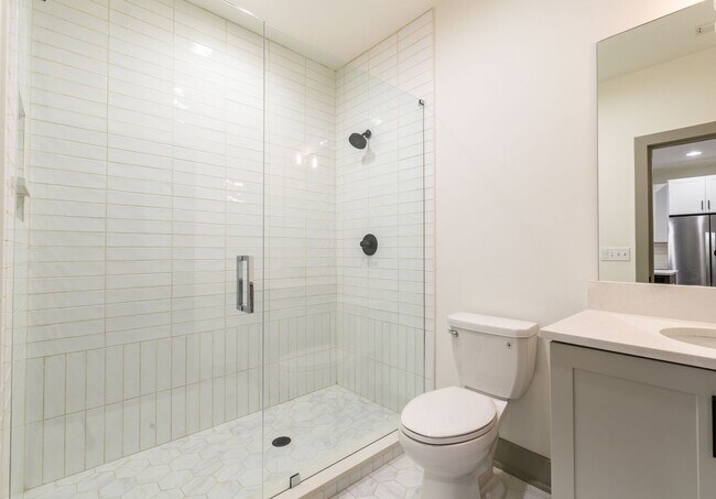 Building Photo - Modern Living Meets Walkable City Charm in...