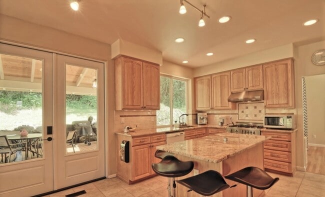Building Photo - An Elegant impeccably maintained home with...