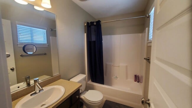 Building Photo - 2 Master Suites Townhome 2 Car Garage