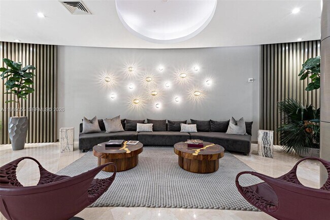 Building Photo - 10275 Collins Ave