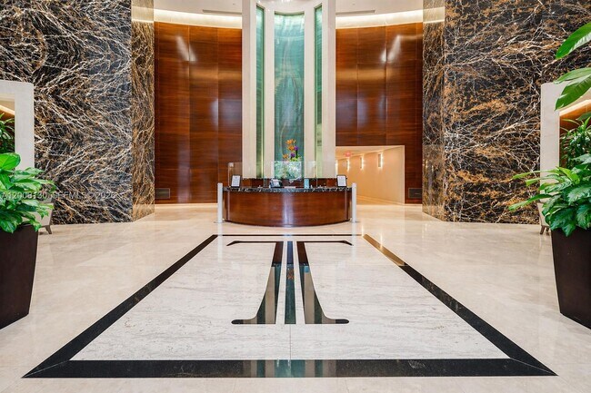 Building Photo - 15811 Collins Ave