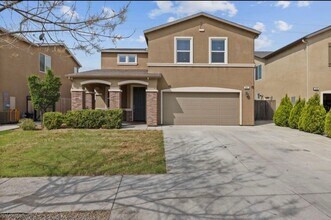 Building Photo - SE Two story home coming soon