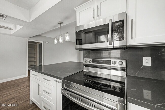 Building Photo - 4554 E Paradise Village Pky N