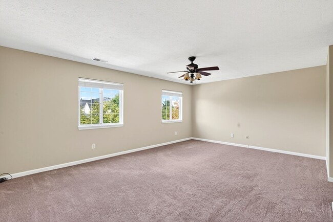 Building Photo - Charming Fishers Condo – Move-In Ready
