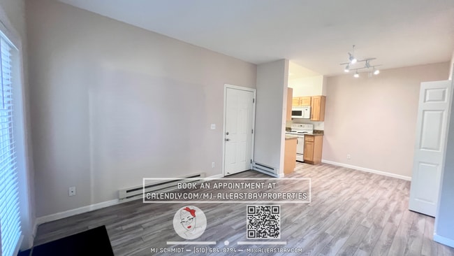 Building Photo - Beautiful 1-bedroom condo nestled in gated...