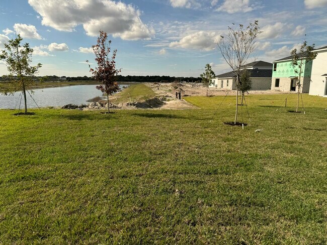 Building Photo - 10468 NW Suncrest Lp