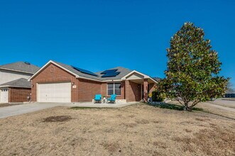Building Photo - Slash Your Monthly Utility Costs with Solar – Plus, Pets Are Welcome with NO Breed Restrictions!