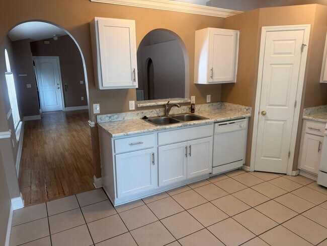 Building Photo - 7323 Lawn Tennis Ln