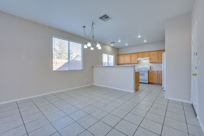 Building Photo - NW!! POOL!!!! GATED!!! Com. Park!!! Low Maintenance desert landscape front Yard. New Carpet!! Ups...