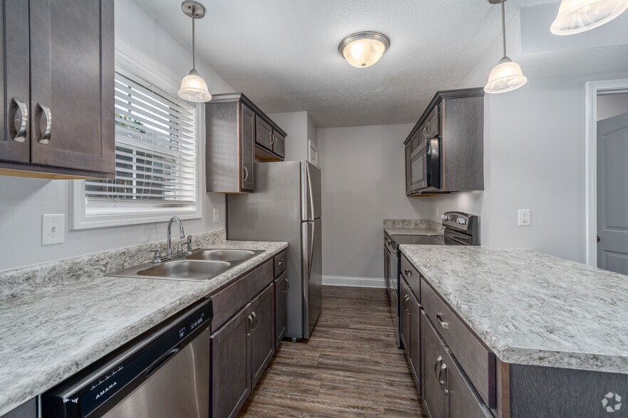 2BR, 2.5BA - 1,100SF - Kitchen - Professional Park Townhomes