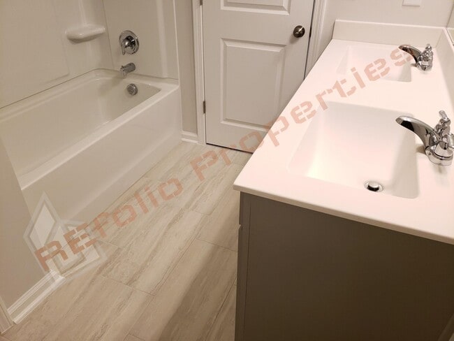 Building Photo - Brand New 3 BR 1-Car Garage Townhome in Do...