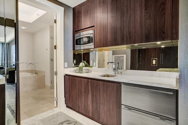Building Photo - 9705 Collins Ave