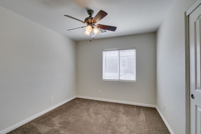 Building Photo - Great townhome in Henderson Gated Community with a 2 car attached garage and backyard