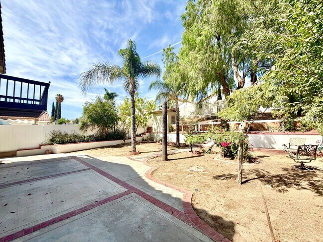 Building Photo - Spacious 5 Bedroom 3 Bathroom Home with Updated Paint, New Roof & Private Balcony