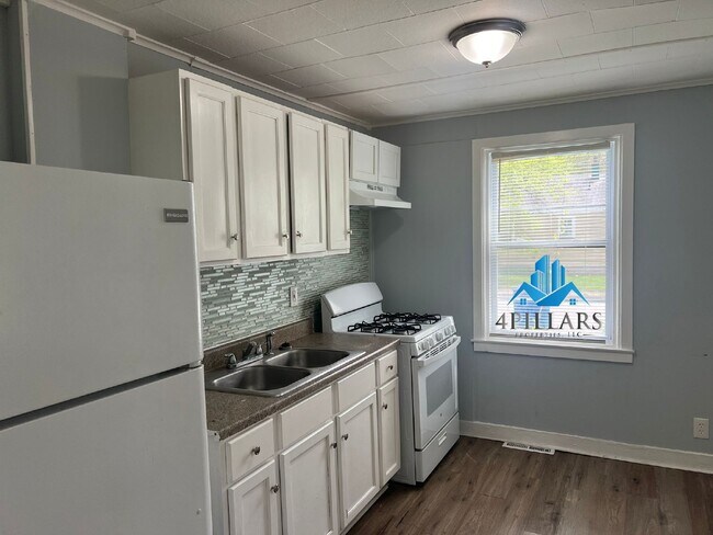 Building Photo - Charming 2 Bedroom Duplex in La Porte with Spacious Layout and Prime Location