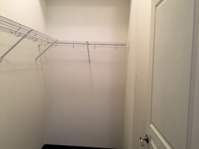 Master bedroom walk in closet - 13360 Burbank Blvd