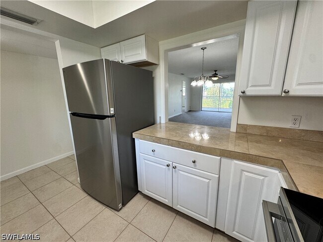 Building Photo - 12250 Tamiami Trl E