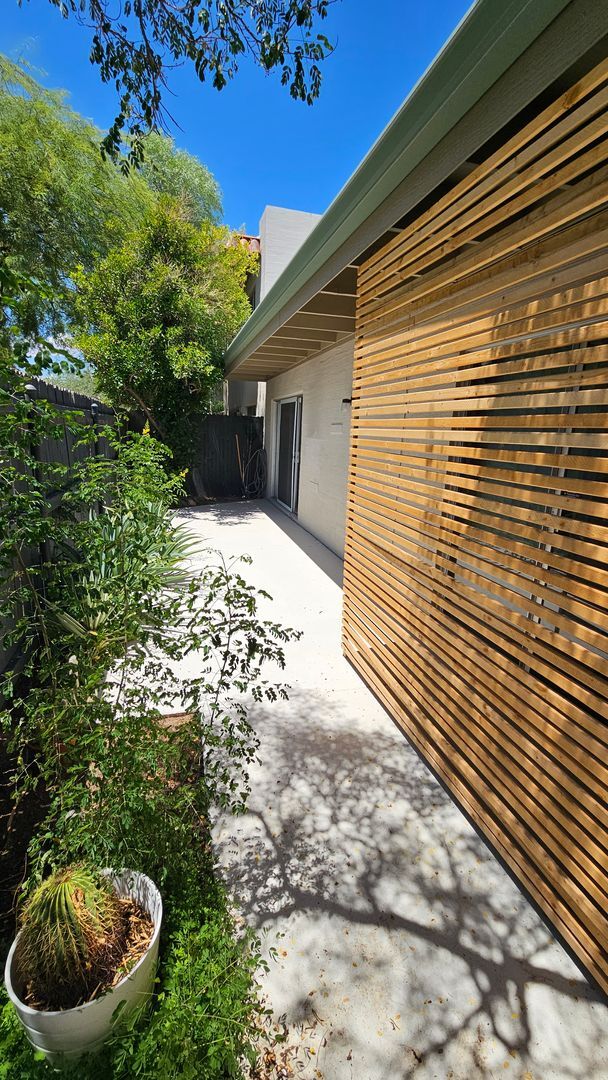 Building Photo - This is a must-see chic and updated townho...